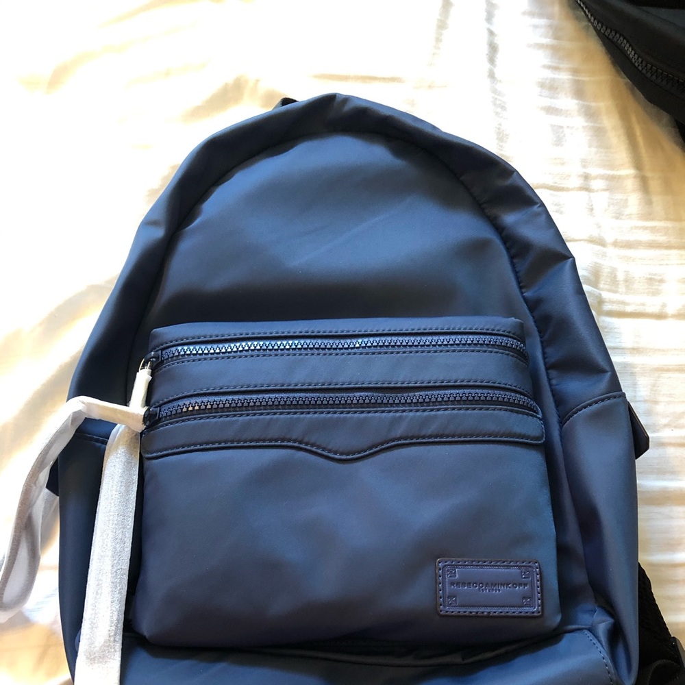 Navy blue nylon backpack